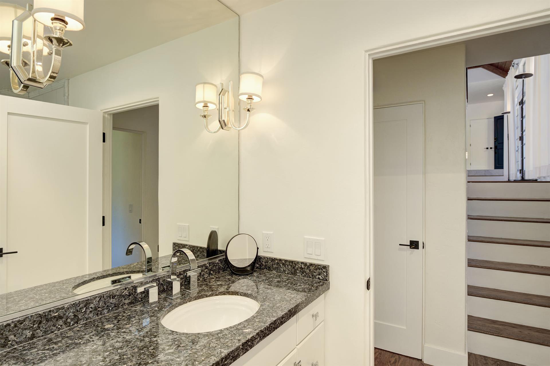 Downstairs Hall Bathroom with Shower Over Tub Combo