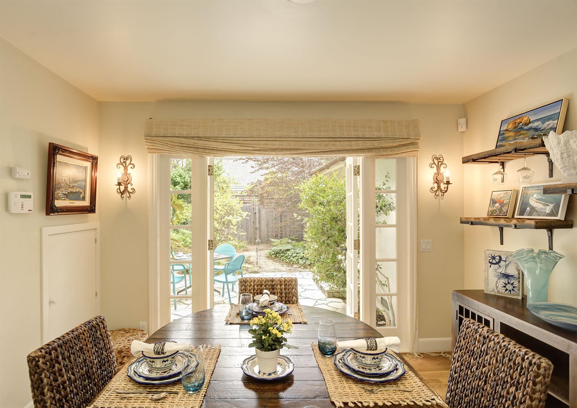 Dining Area Opens to the Back Patio