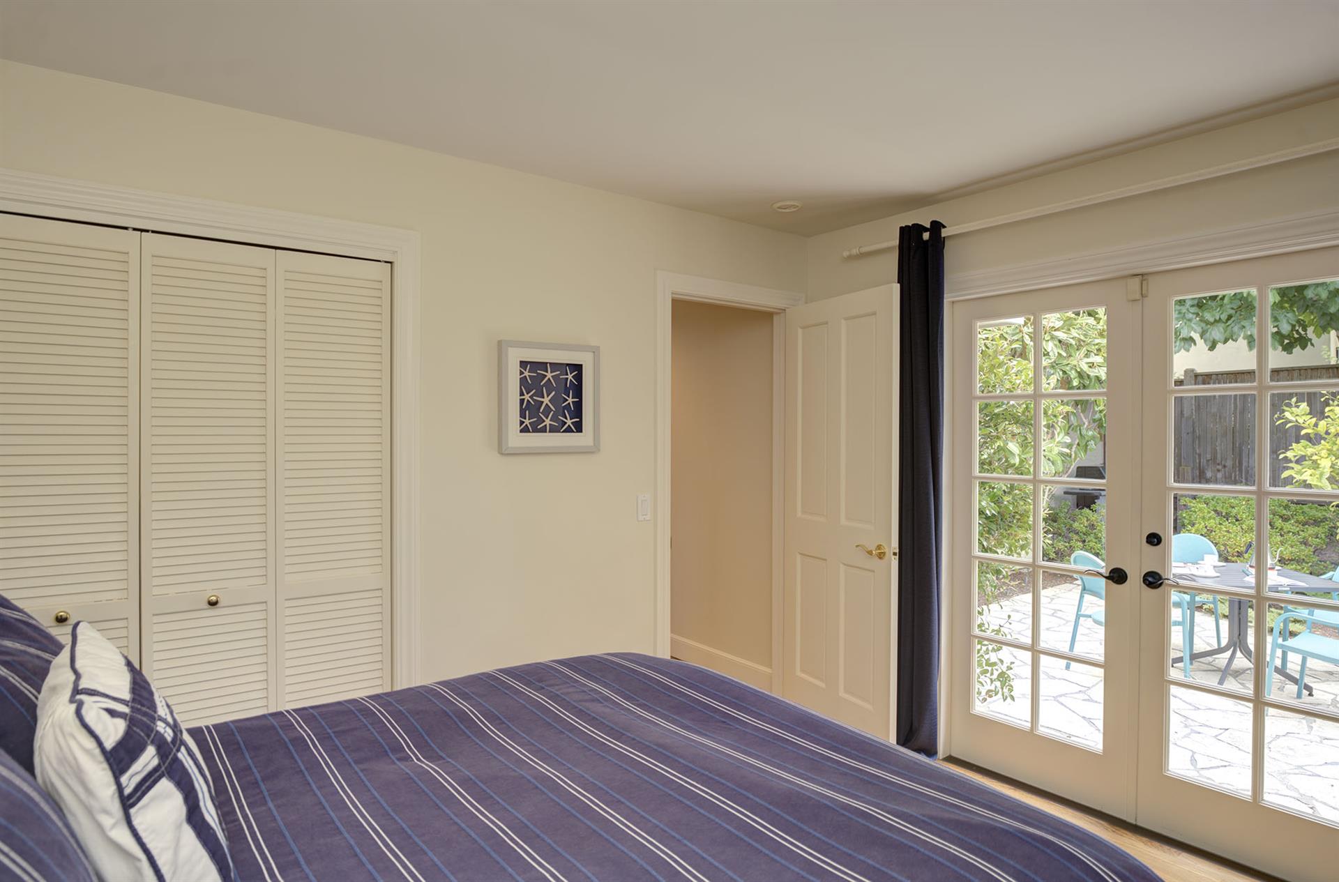Bedroom 2  Downstairs, Queen Bed, Patio Access