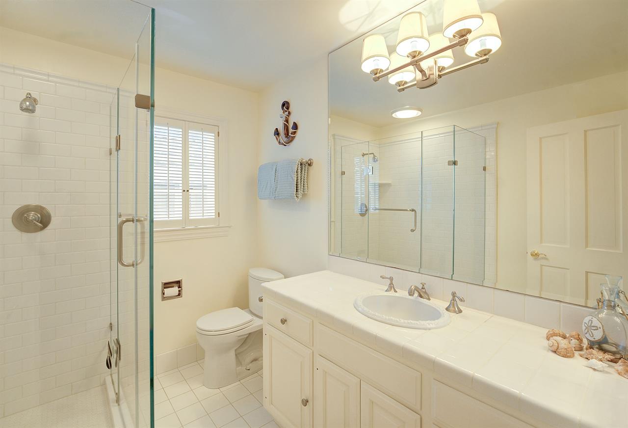 Full Hall Bathroom with a Shower for Bedroom 2 Downstairs