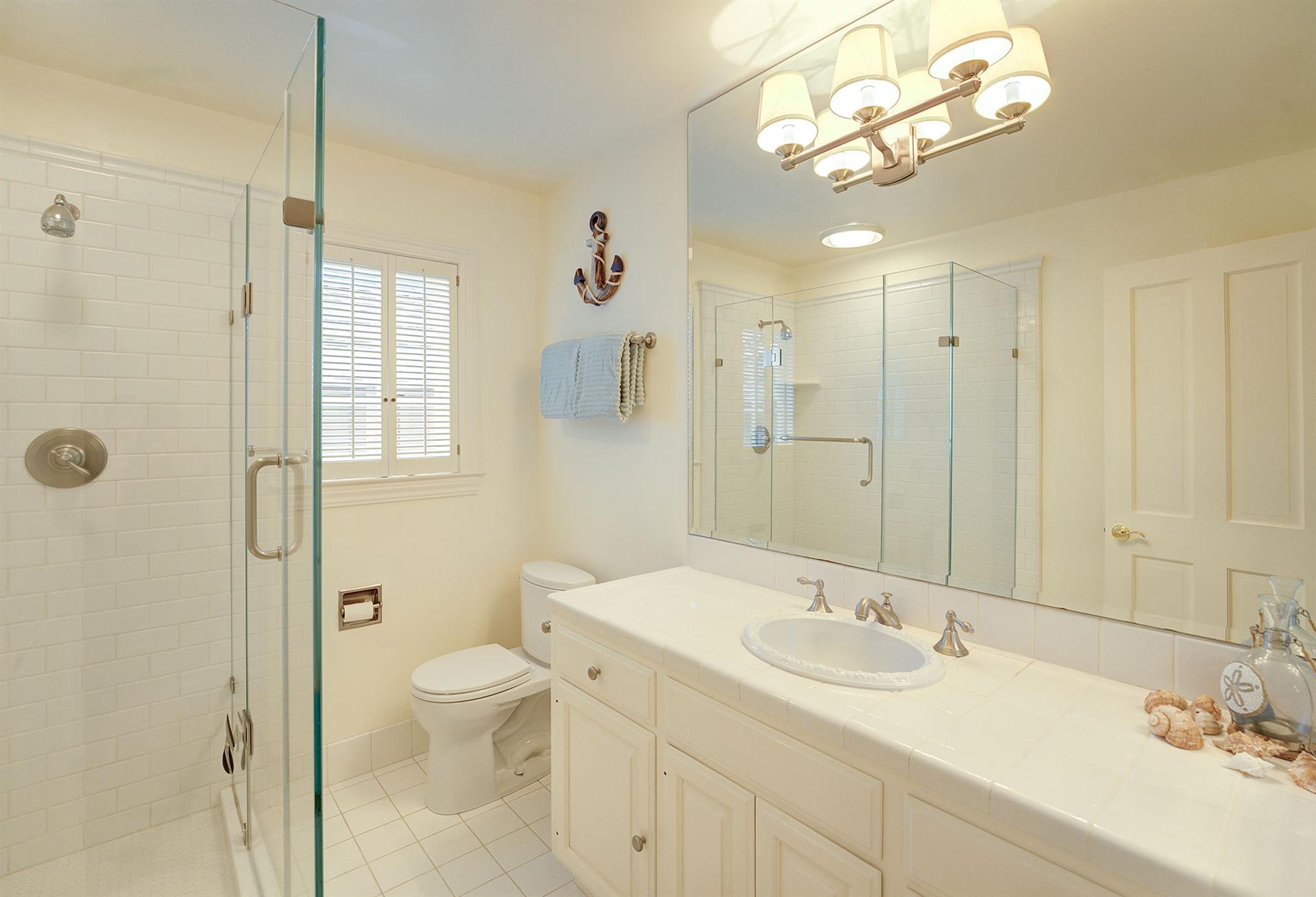 Full Hall Bathroom with a Shower for Bedroom 2 Downstairs