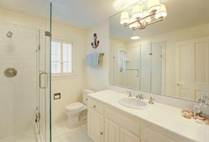 Full Hall Bathroom with a Shower for Bedroom 2 Downstairs