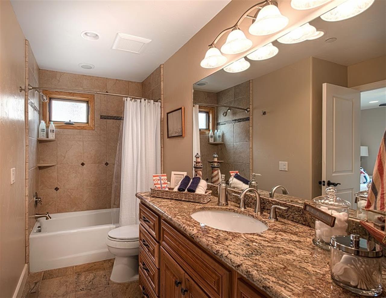 Downstairs Bathroom with Shower Over Tub