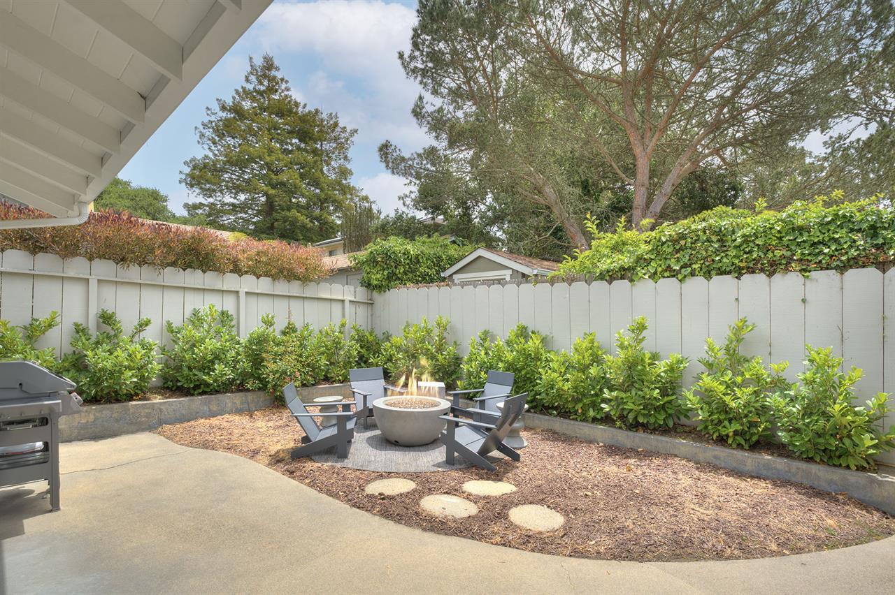 Backyard has a Gas BBQ Grill and a Fire Pit