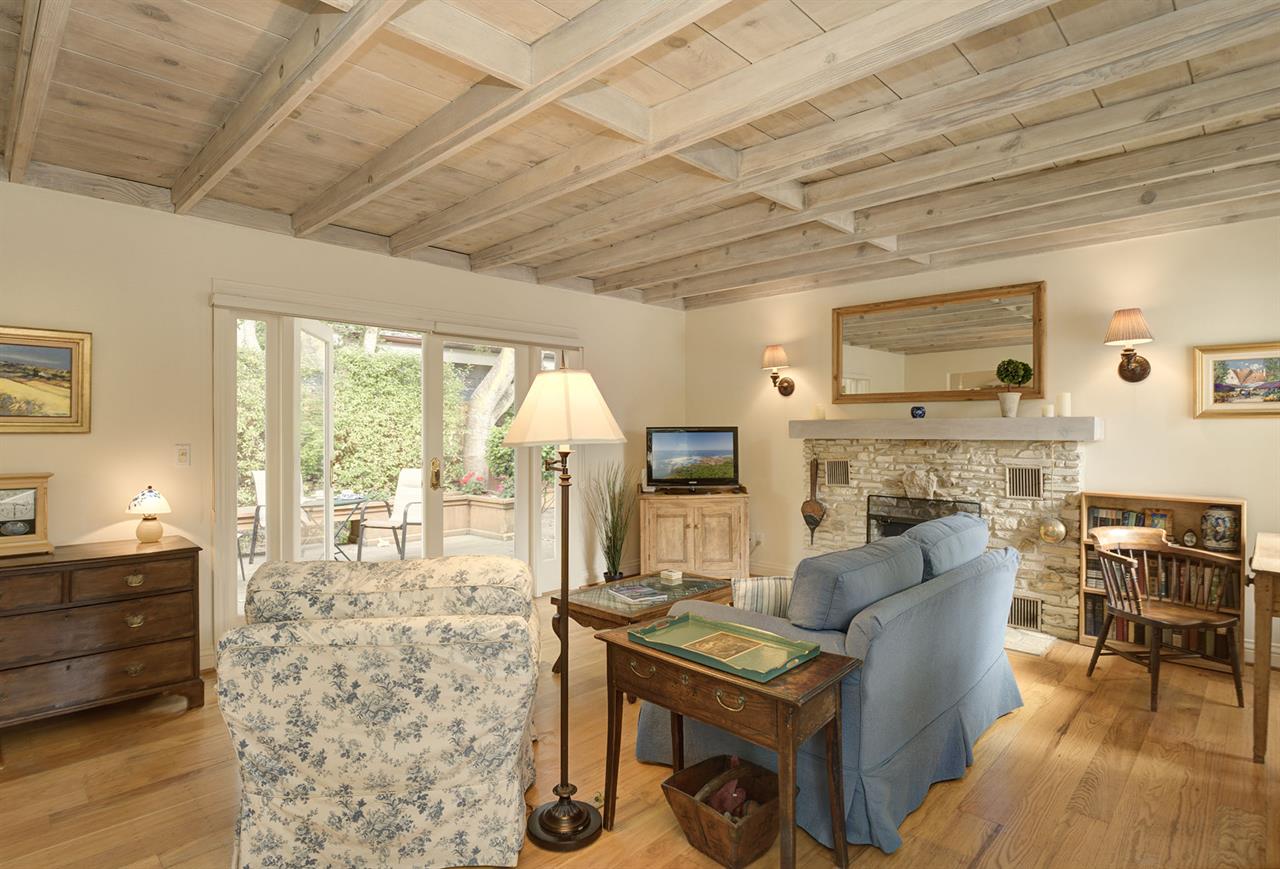 Living Room with Cable TV, Decorative Candlelit Fireplace