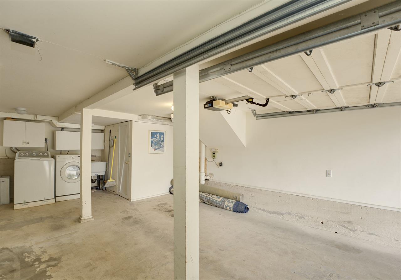 Garage with the Washer and Dryer  Room for One Car