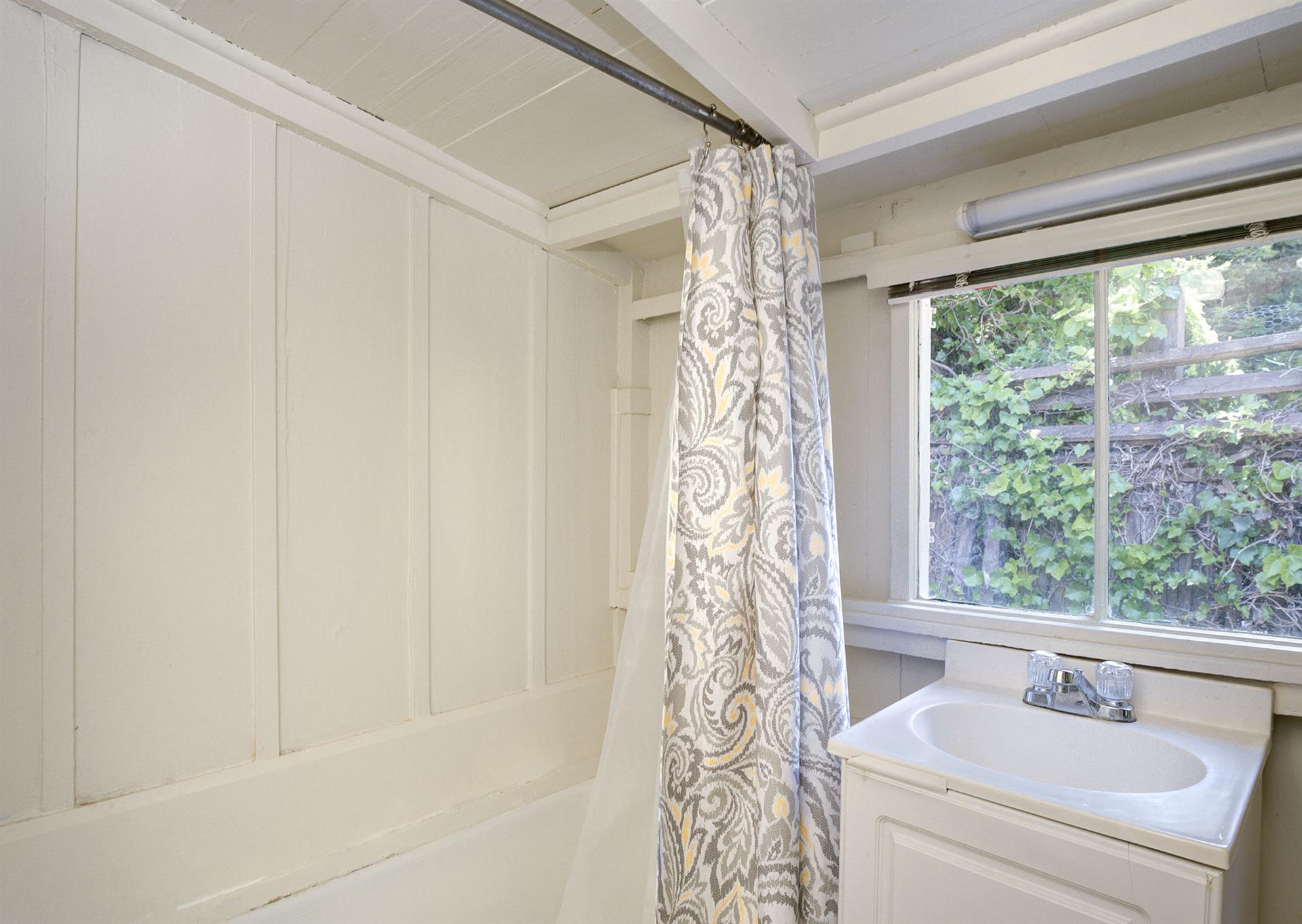 Bathroom has a ShowerOverTub Combo
