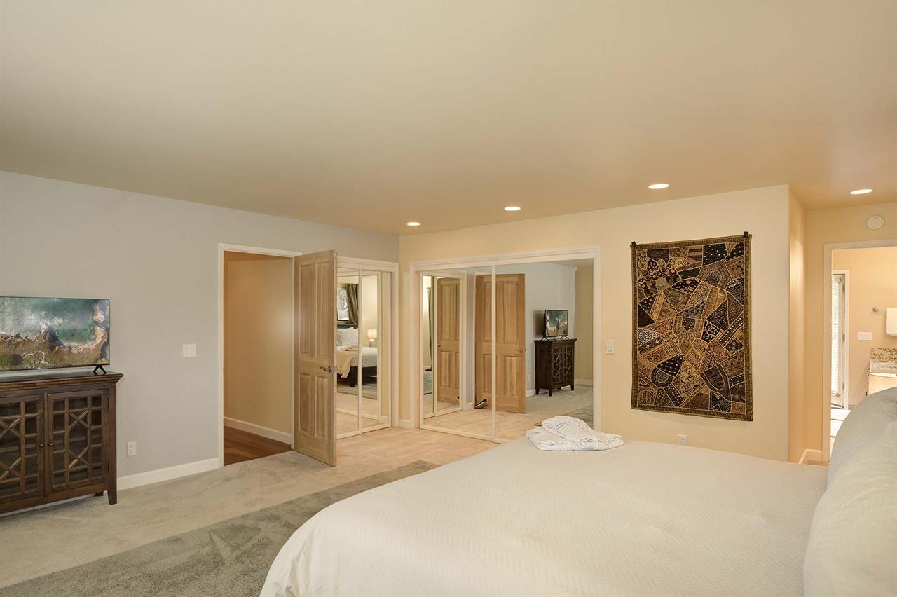 Bedroom 1  King Bed, SmartTV, EnSuite Bath with a Shower