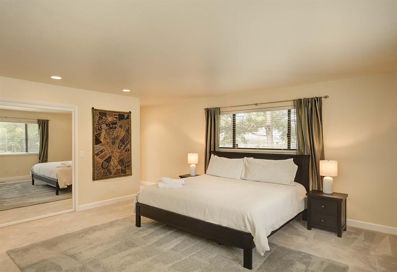 Bedroom 1  King Bed, SmartTV, EnSuite Bath with a Shower