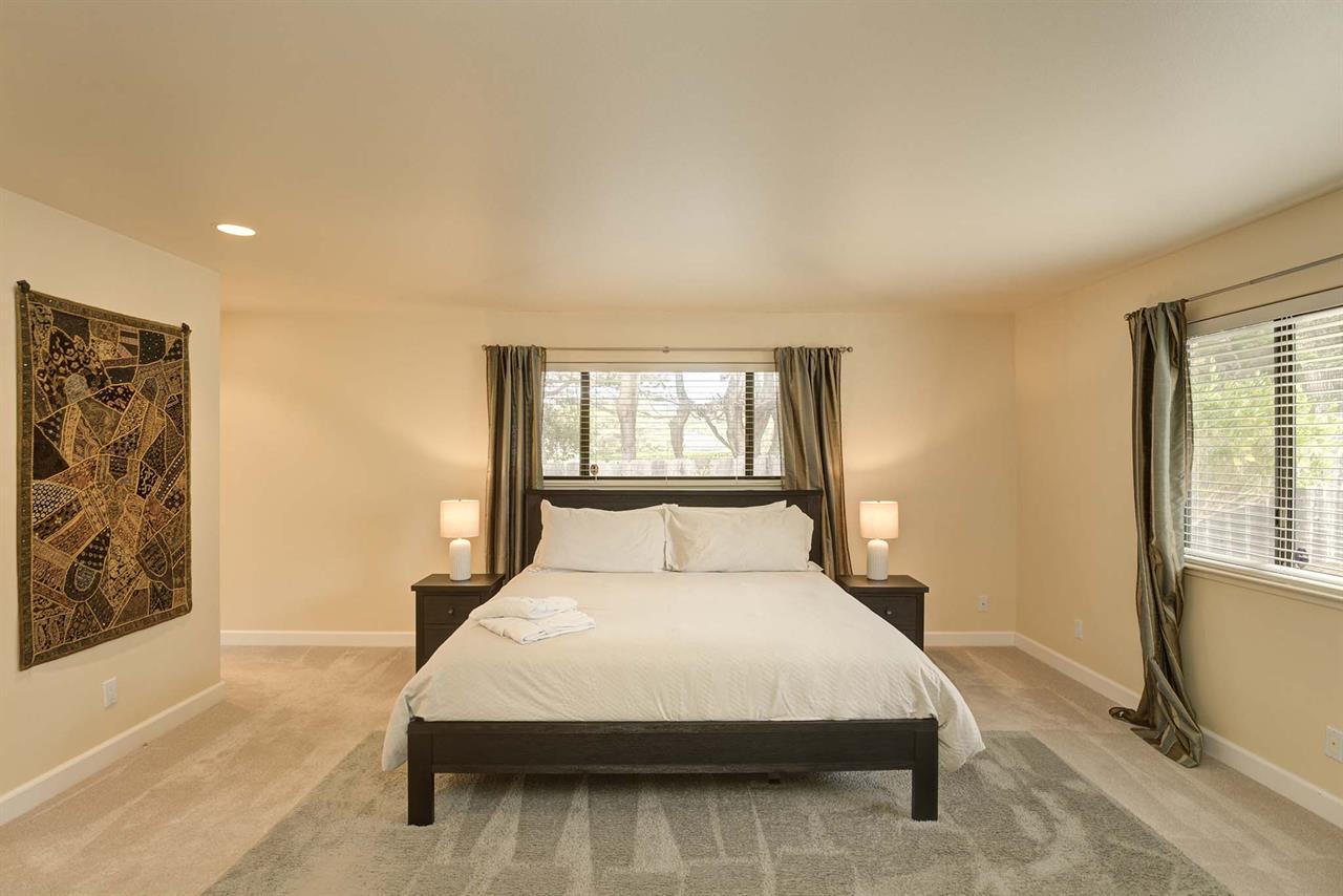 Bedroom 1  King Bed, SmartTV, EnSuite Bath with a Shower