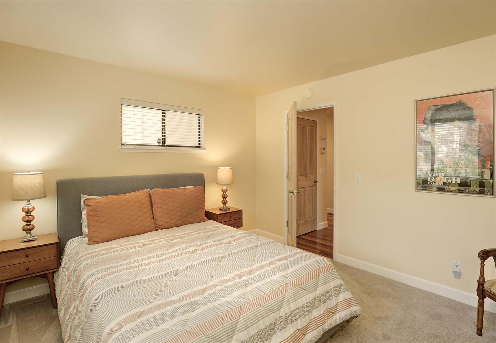 Bedroom 2 has a Queen Bed and a SmartTV