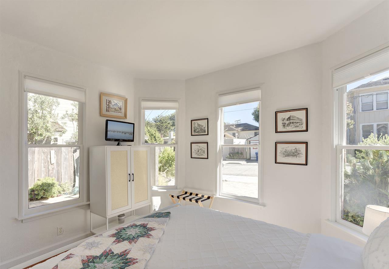 Main Floor  Bedroom 1 has a King Bed and TV