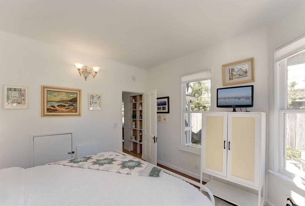 Main Floor  Bedroom 1 has a King Bed and TV