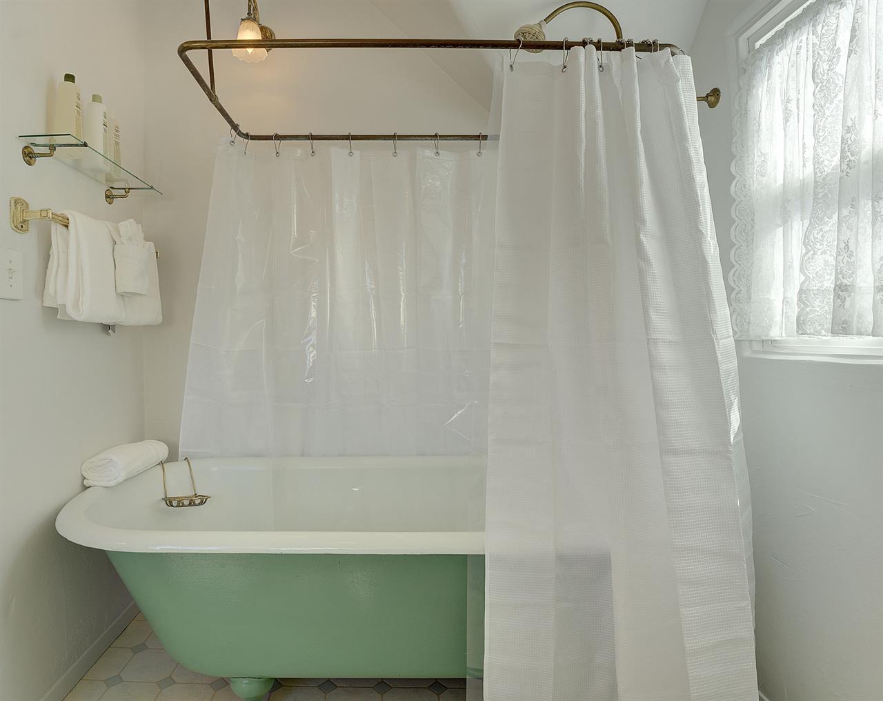 Upstairs  Bathroom 2  has a Tub  Shower Combo