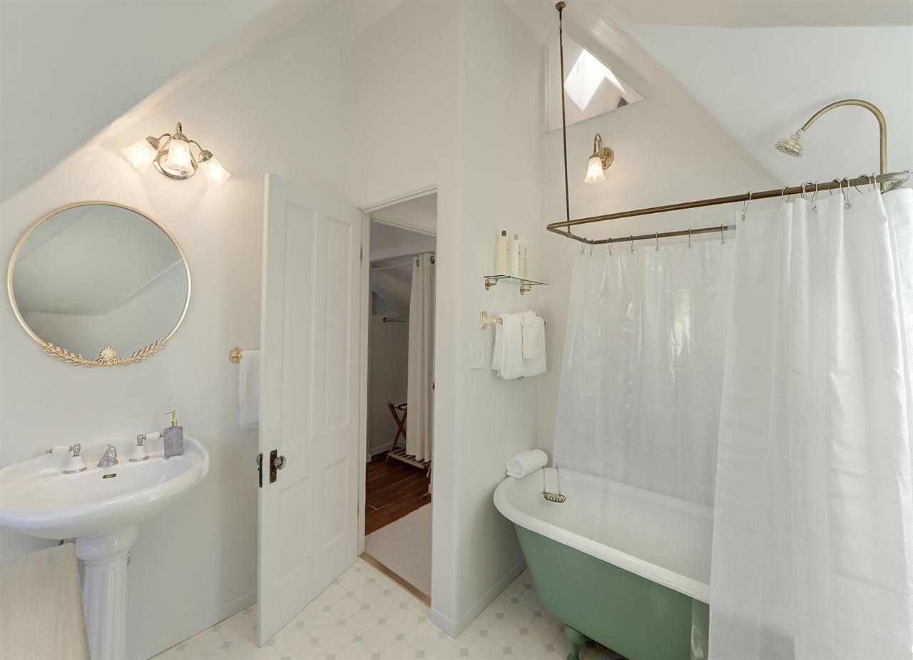 Upstairs  Bathroom 2  has a Tub  Shower Combo