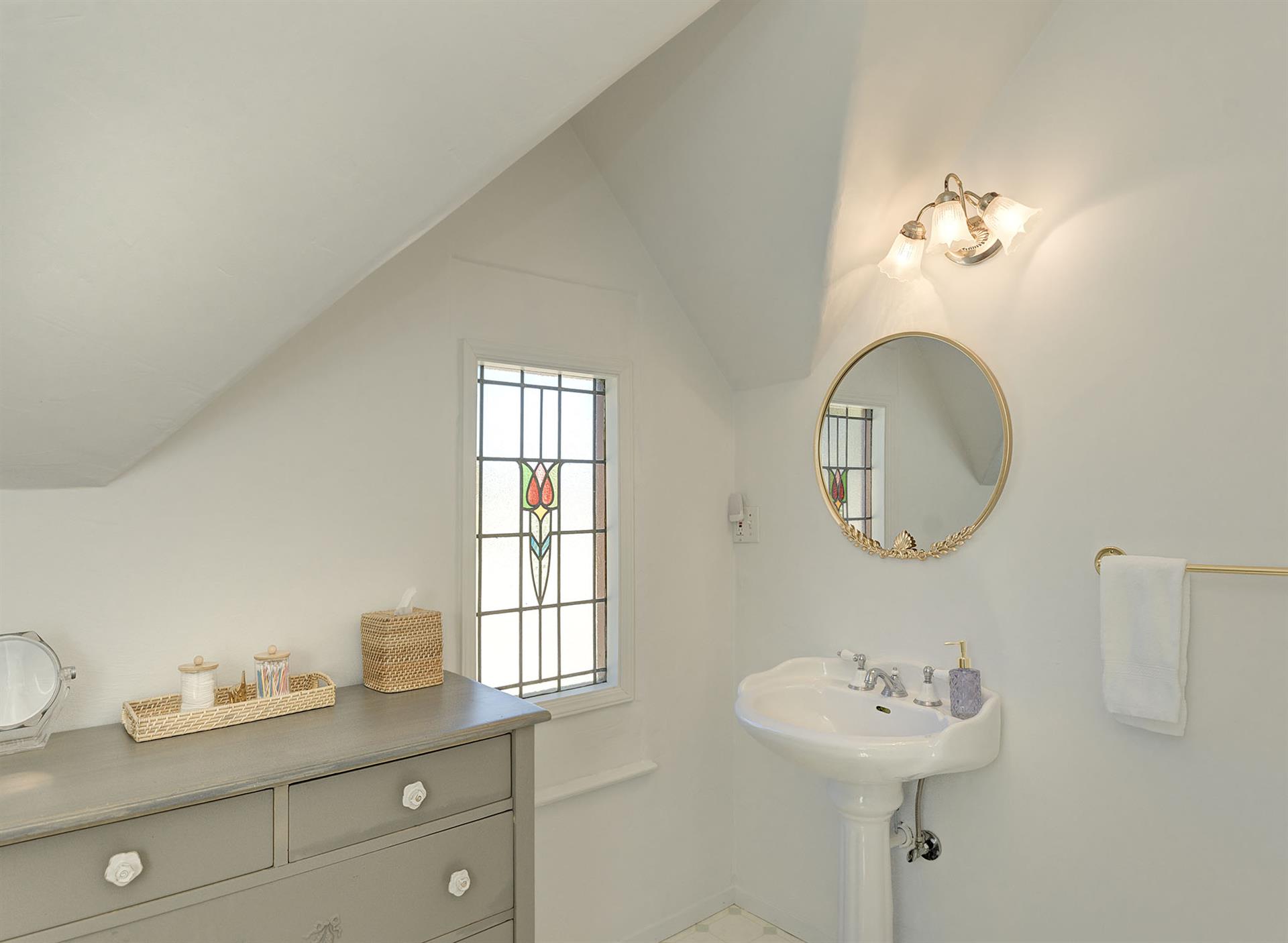 Upstairs  Bathroom 2  has a Tub  Shower Combo