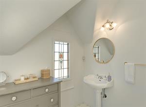 Upstairs  Bathroom 2  has a Tub  Shower Combo
