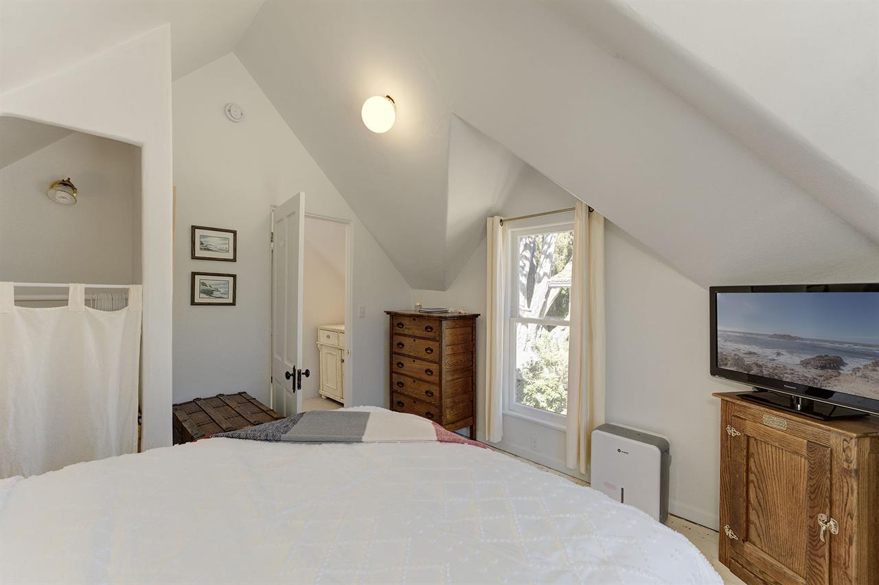 Upstairs  Bedroom 3 has a Queen Bed