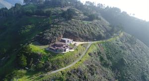 Aerial View of Home and Road