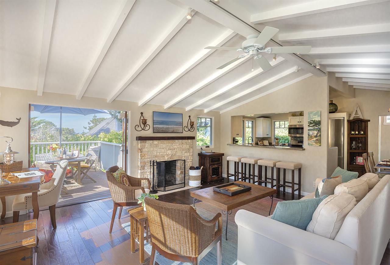 Living Room with Candlelit Fireplace and HDTV