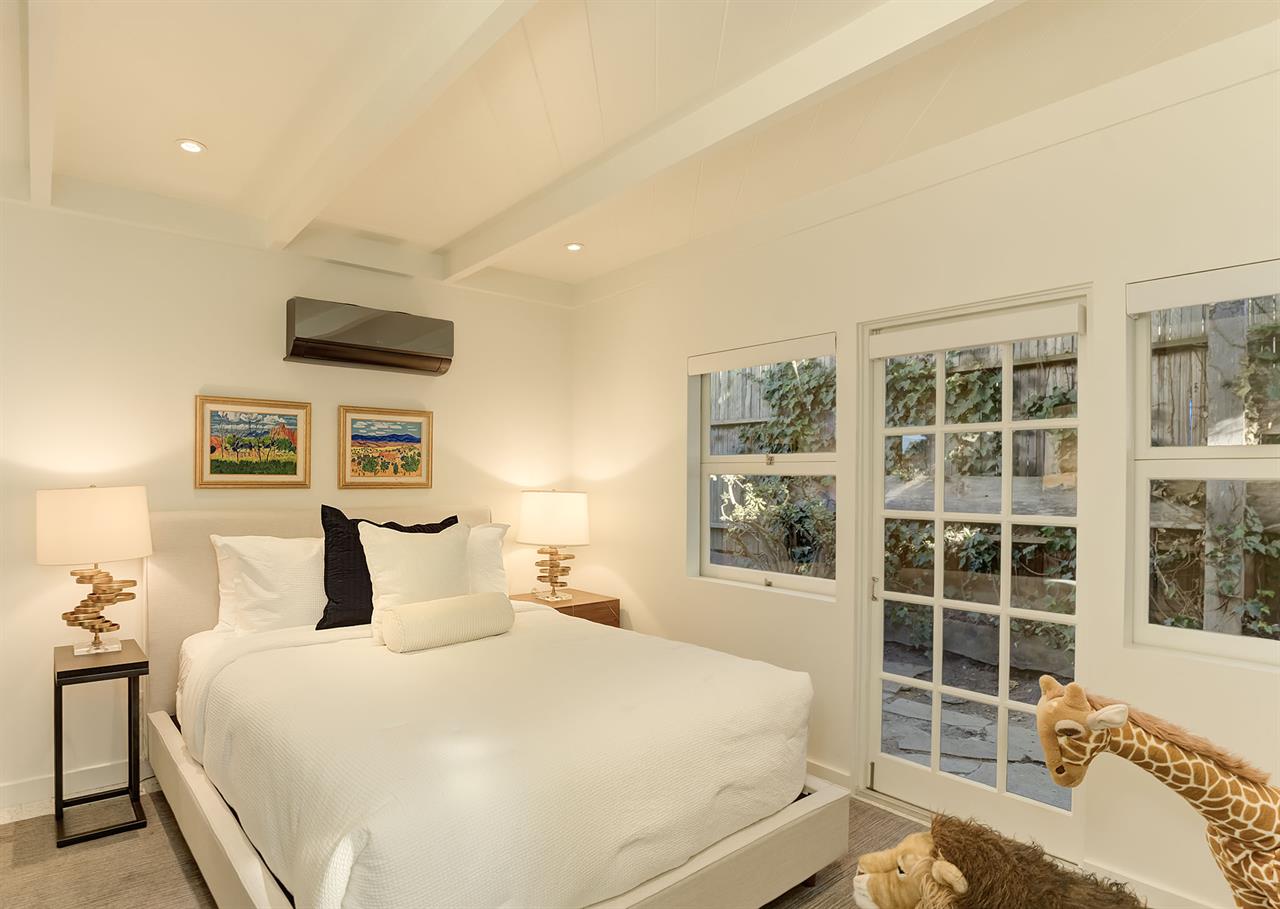 Main Floor  Bedroom 4 has a Queen Bed