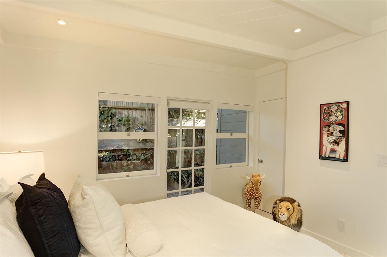 Main Floor  Bedroom 4 has a Queen Bed