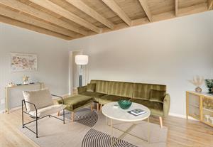 Living Room has an Electric Fireplace and Smart TV