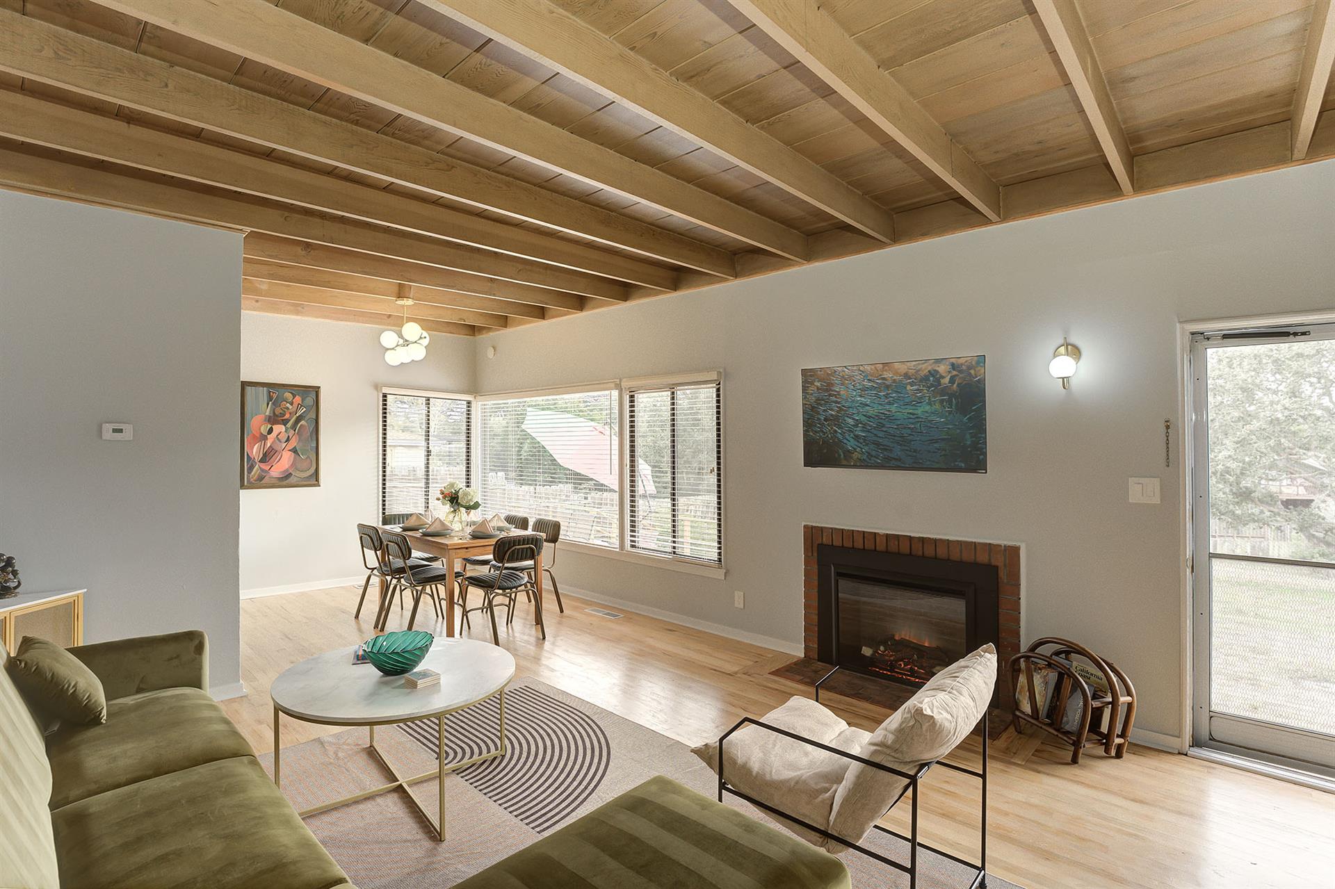 Living Room has an Electric Fireplace and Smart TV