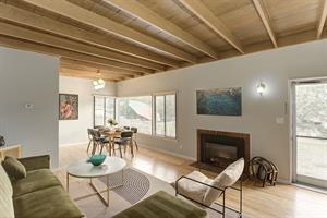 Living Room has an Electric Fireplace and Smart TV