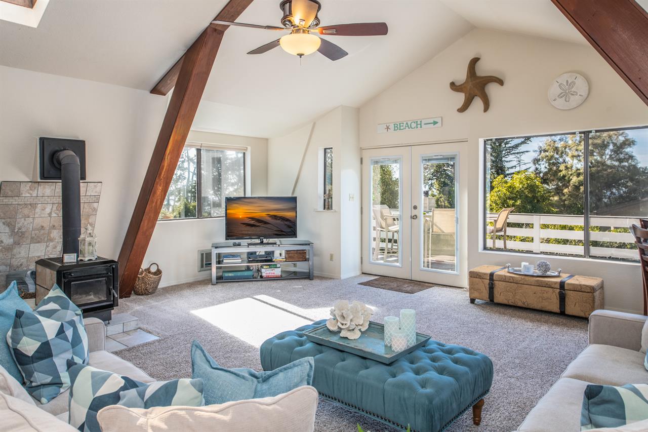 Upstairs Great Room with TV WoodStove Decorative Only