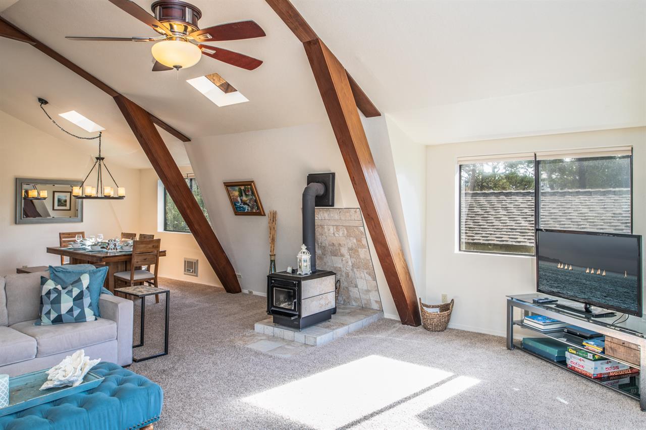 Upstairs Great Room with TV WoodStove Decorative Only