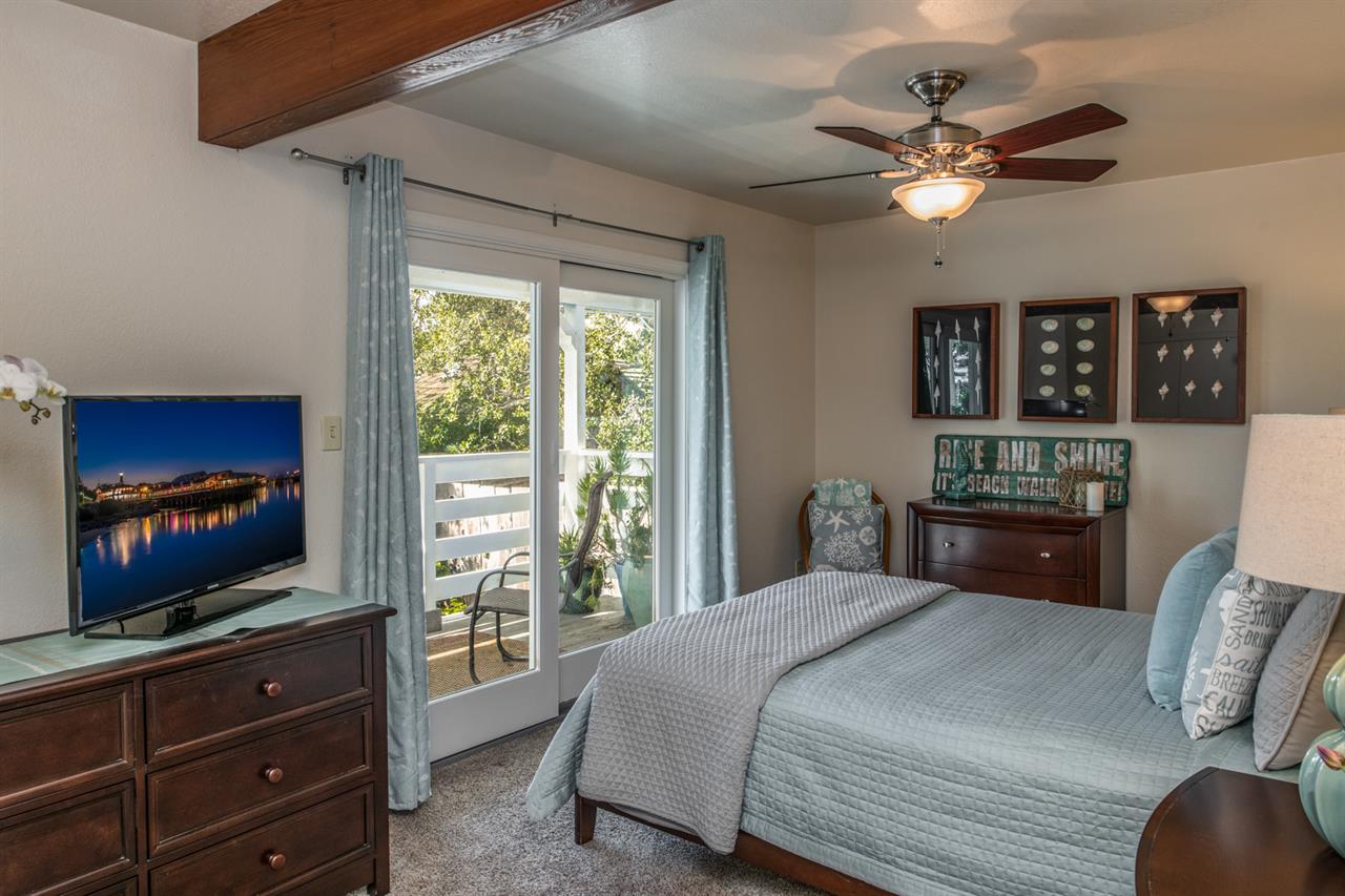 Bedroom 1, Queen Bed, TV, Deck Access, En Suite Bath