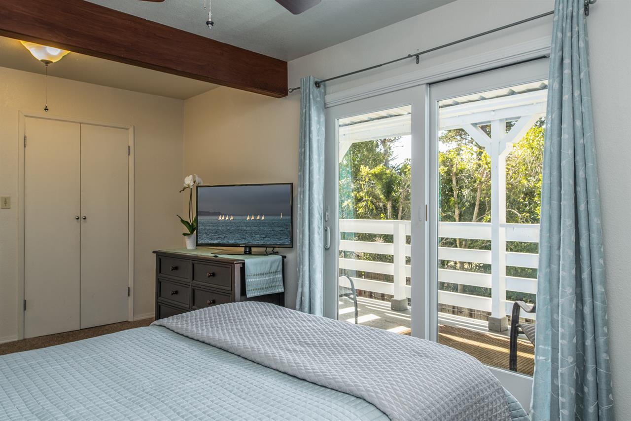 Bedroom 1, Queen Bed, TV, Deck Access, En Suite Bath