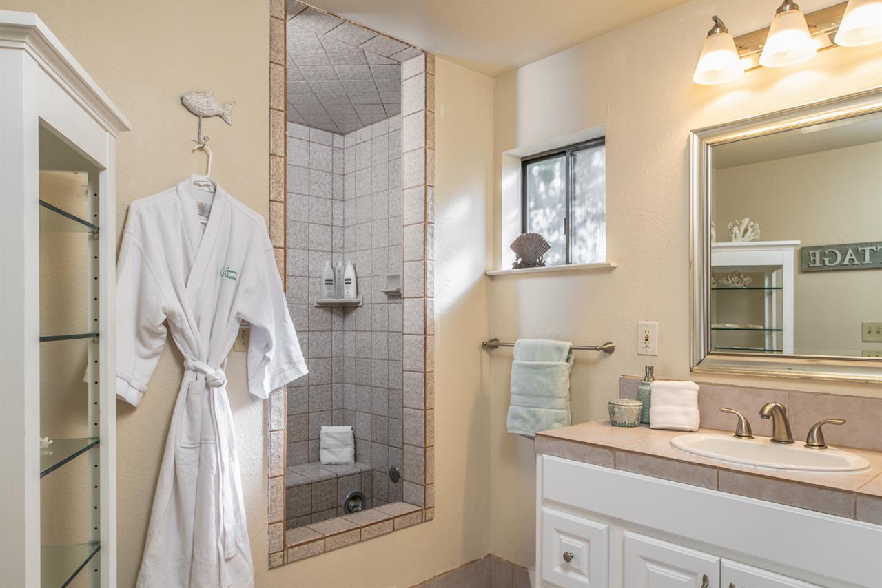 En Suite Bathroom with Tiled ShowerShallow Sunken Tub