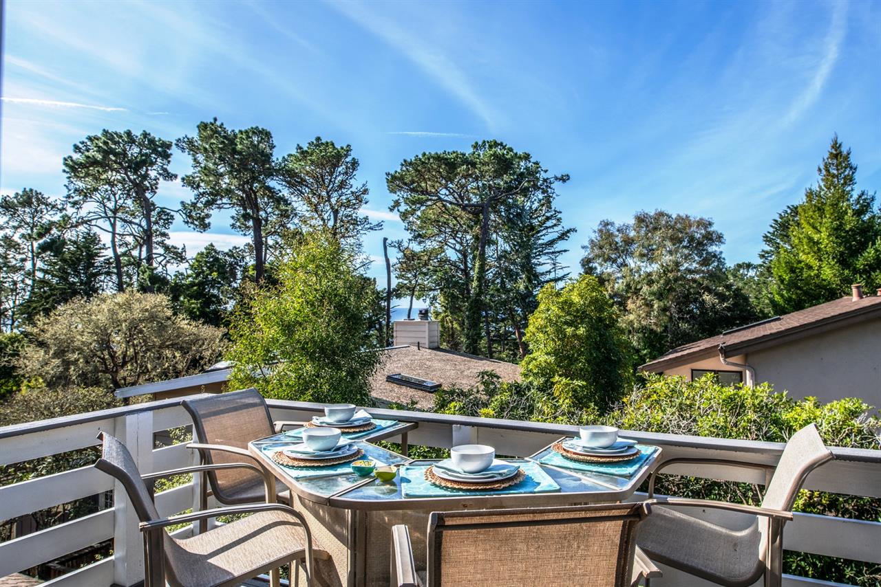 Dining Balcony with Gas BBQ and Distant Ocean View