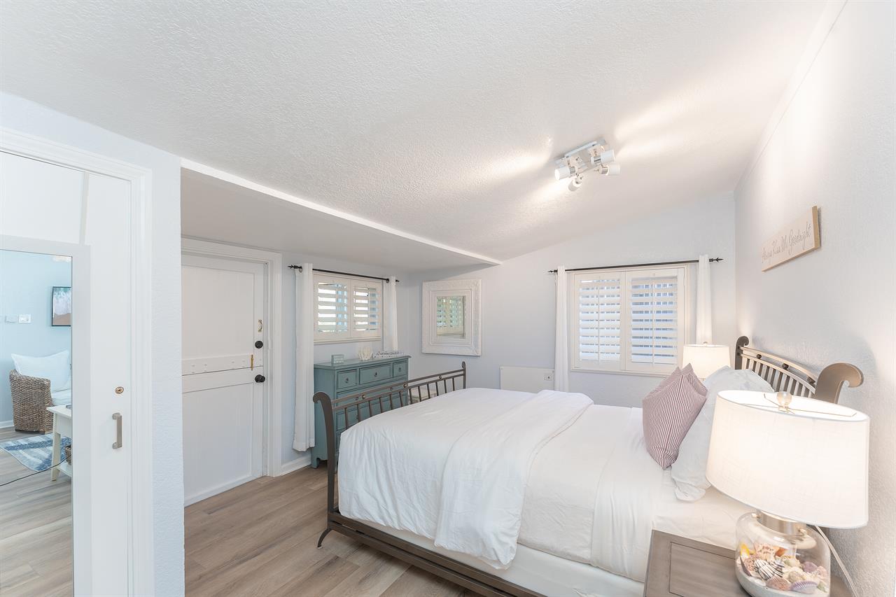 The Bedroom Opens to the Back Patio