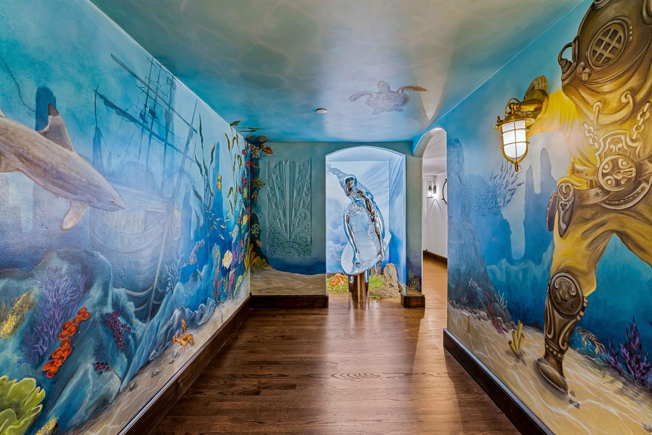 Large Ocean Mural and Silver Surfer Sculpture