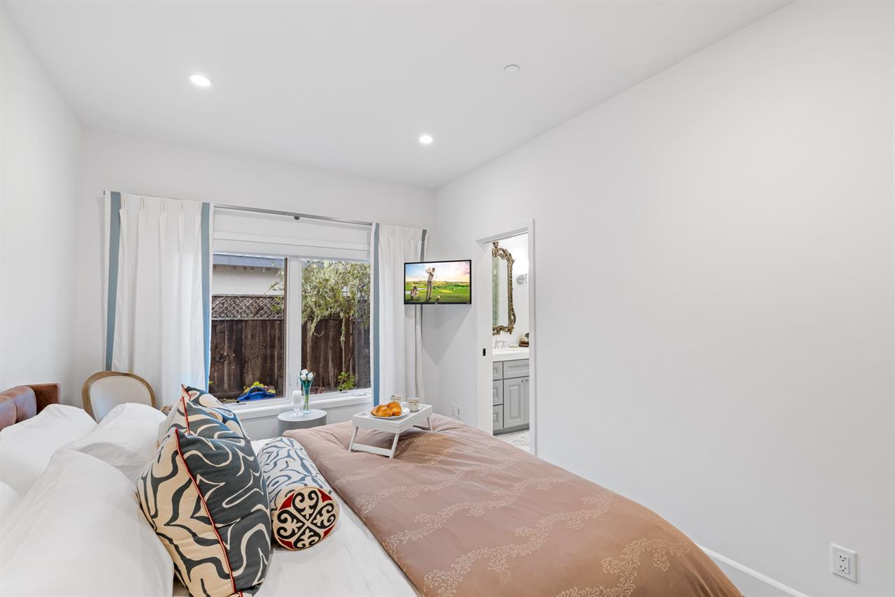 Bedroom 2  King Bed, TV and En Suite Bath with a Shower