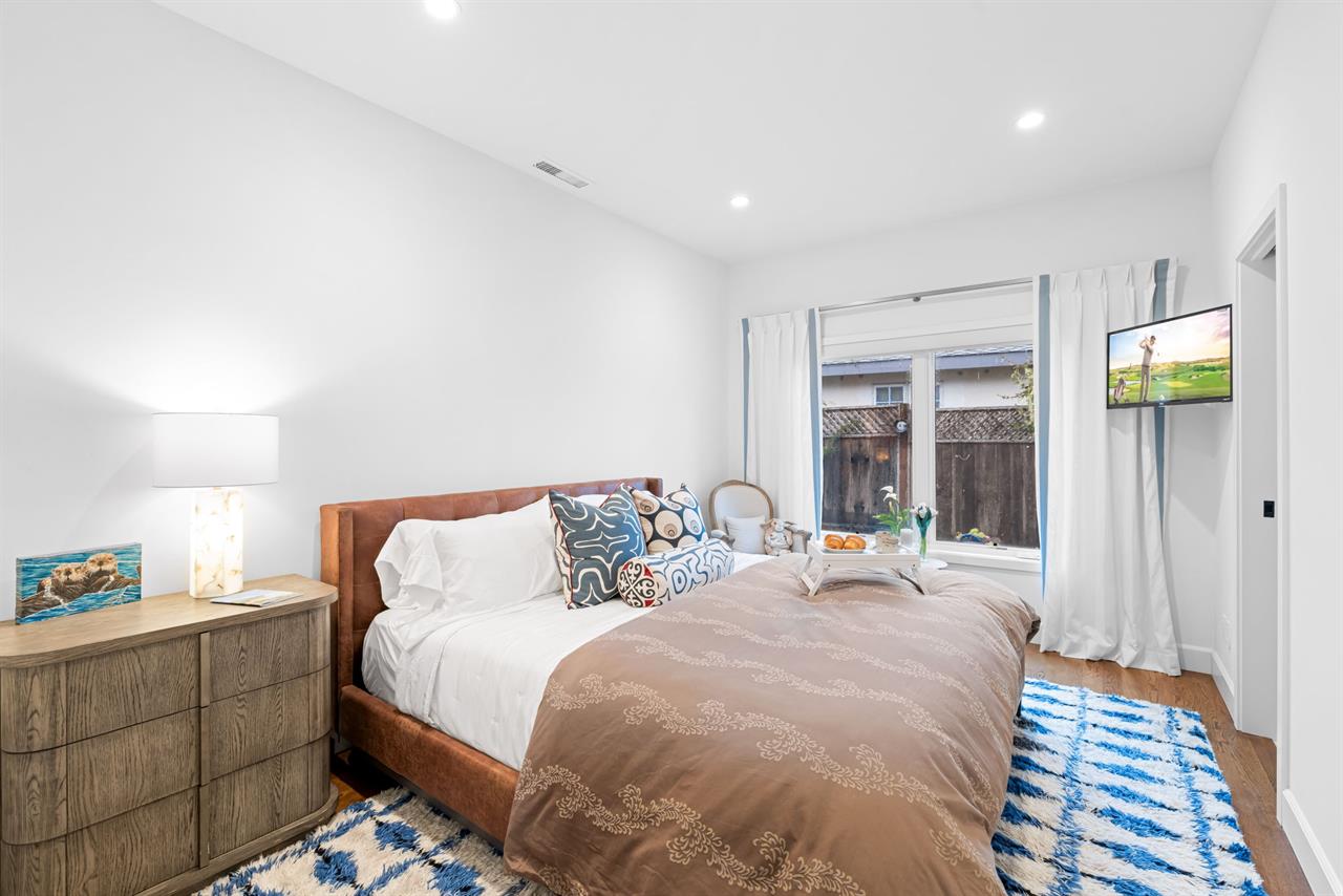 Bedroom 2  King Bed, TV and En Suite Bath with a Shower