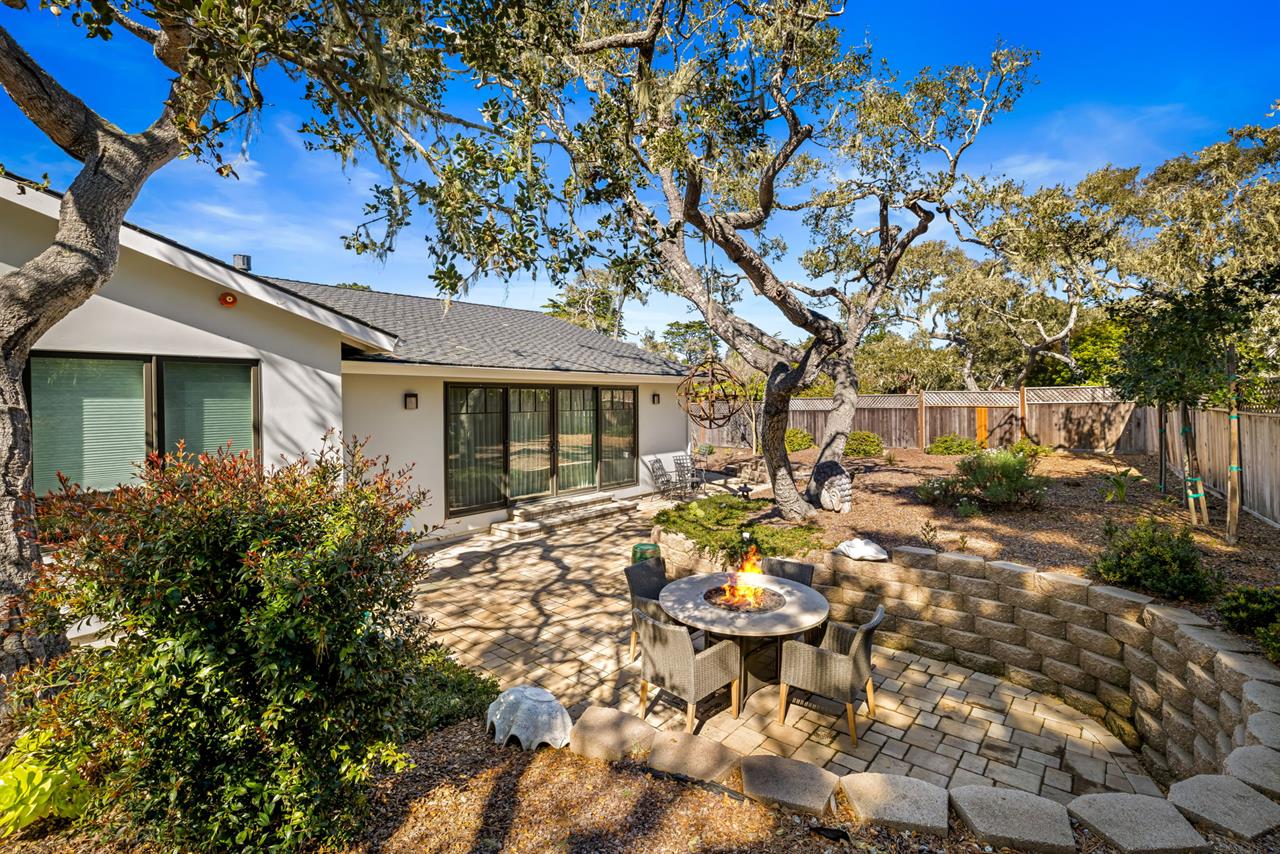 Backyard has a Fire Pit Table