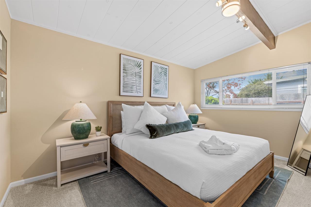 Bedroom 1 has a King Bed and EnSuite Bath