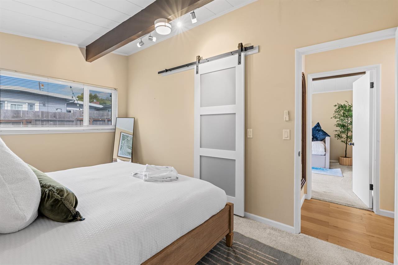 Bedroom 1 has a King Bed and EnSuite Bath