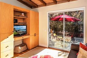 Den with HDTV and a Queen Sofabed