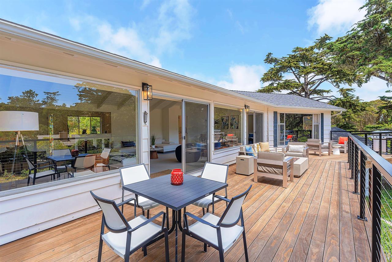 Spacious Outdoor Living and Dining Deck has a FirePit