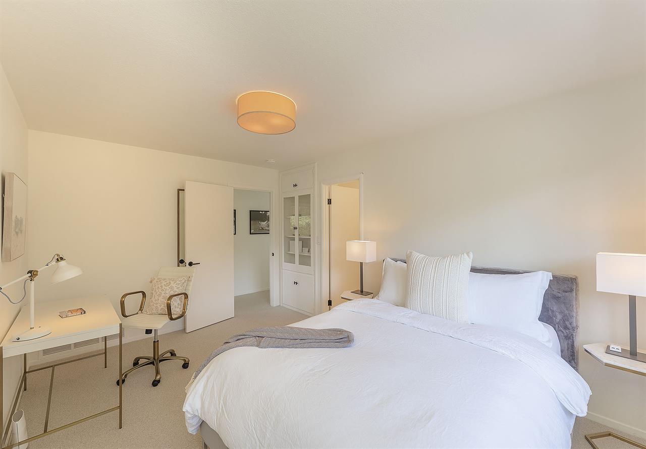 Bedroom 3  Queen Bed, Desk, En Suite Bath with a Shower