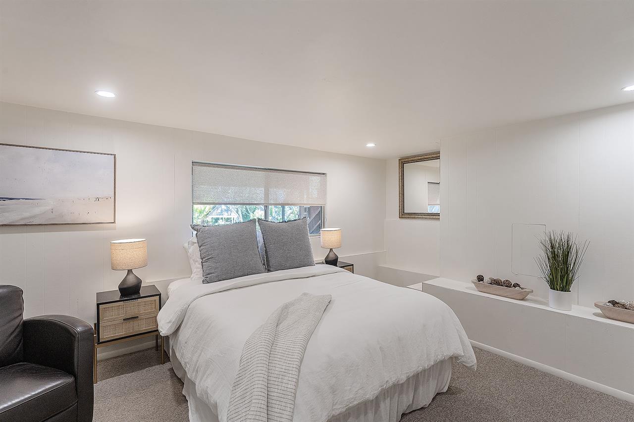 Downstairs  Bedroom 4  Queen Bed, Next to the Powder Room