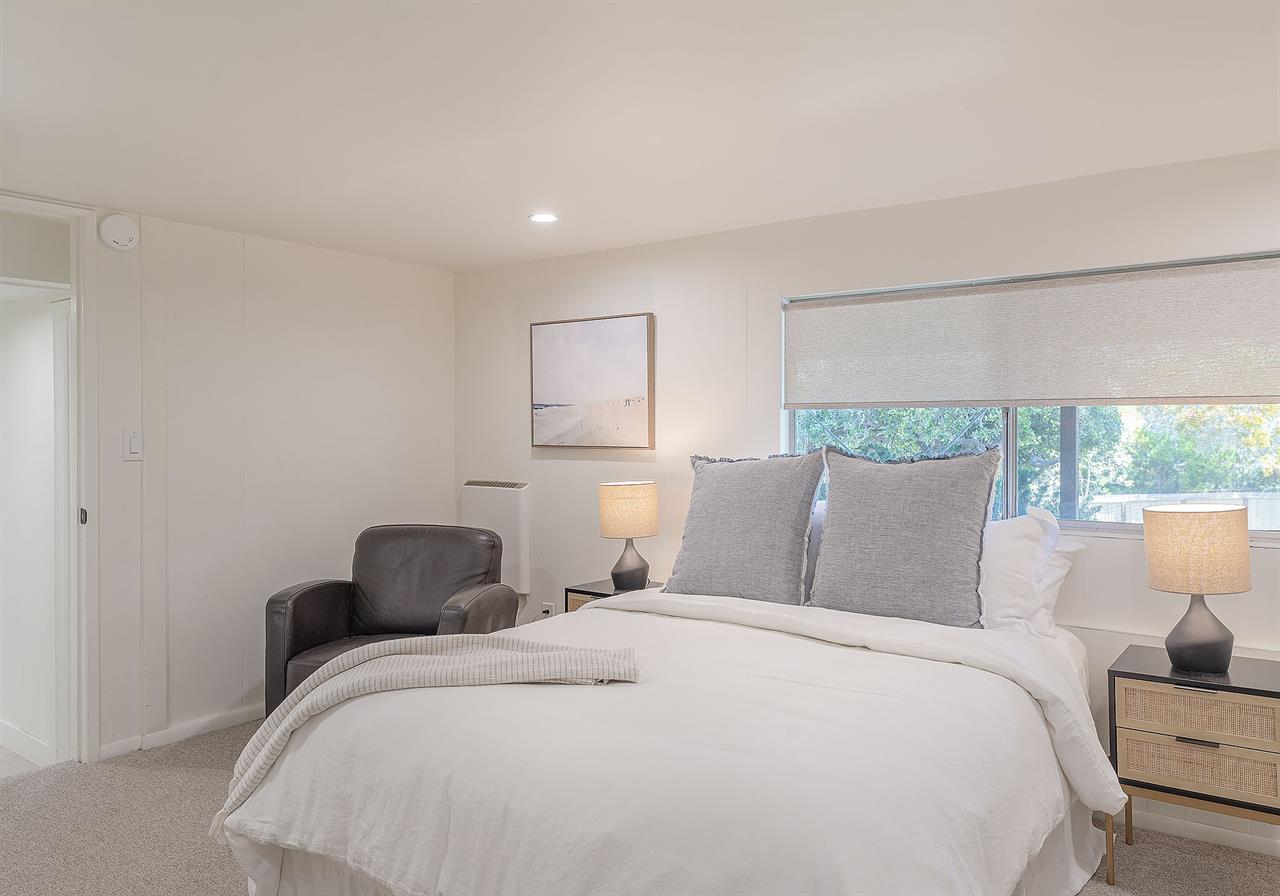 Downstairs  Bedroom 4  Queen Bed, Next to the Powder Room