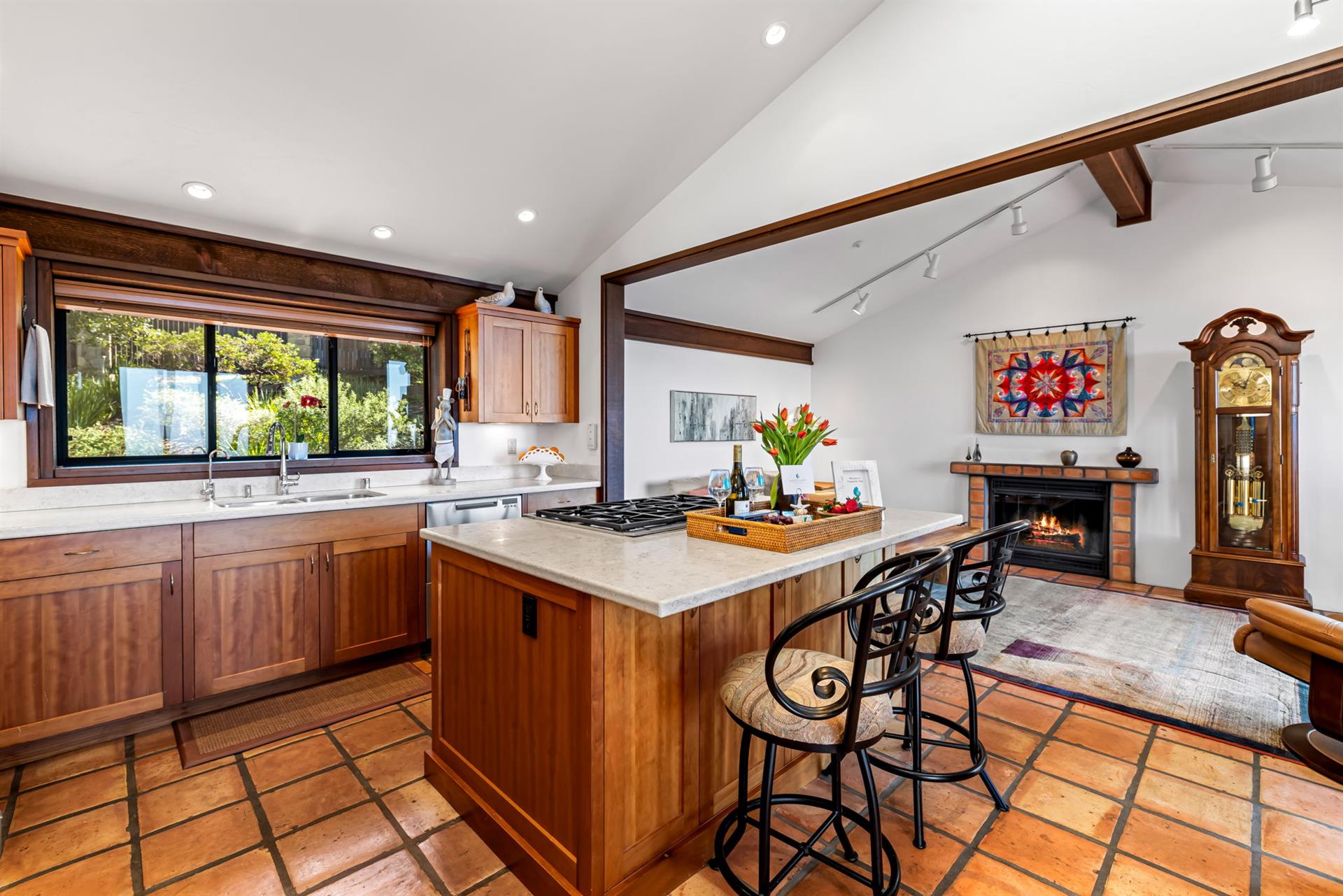 Kitchen and Small Family Room with a WoodBurning Fireplace