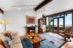 Small Family Room Next to the Kitchen has Ocean Views