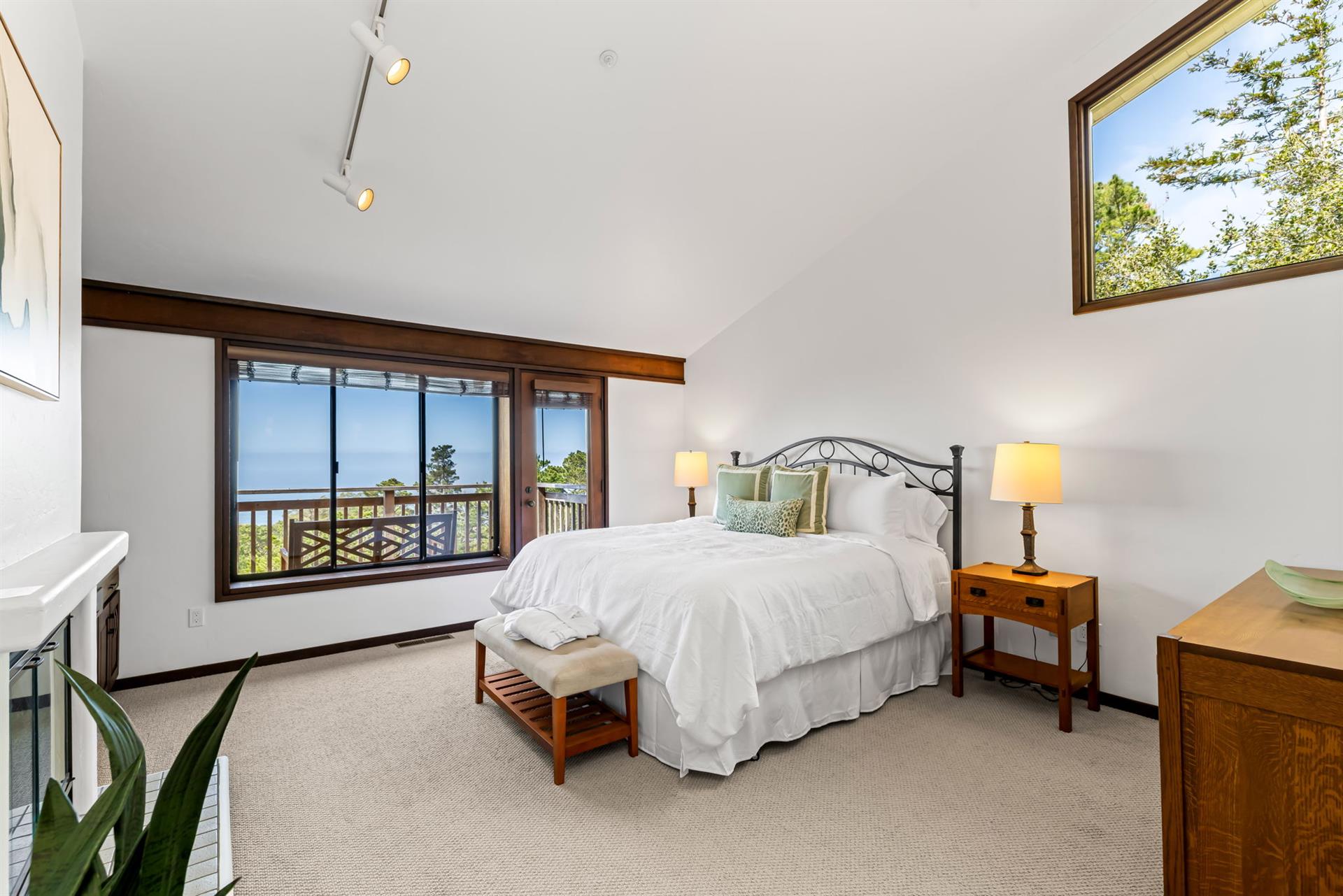 Bedroom 1  King Bed, WoodBurning Fireplace and Ocean View